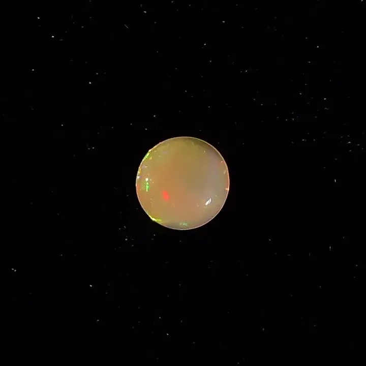 0.69 ct Brown Opal - Round