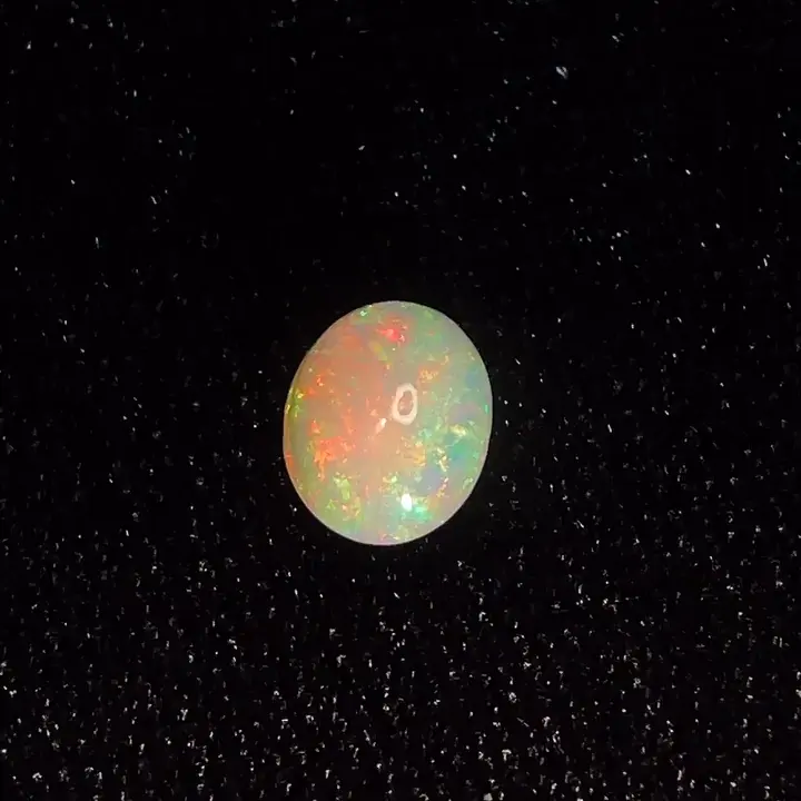 0.68 ct Orange Opal - Oval
